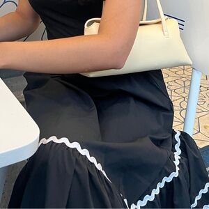 Black ruffle maxi skirt with white trim